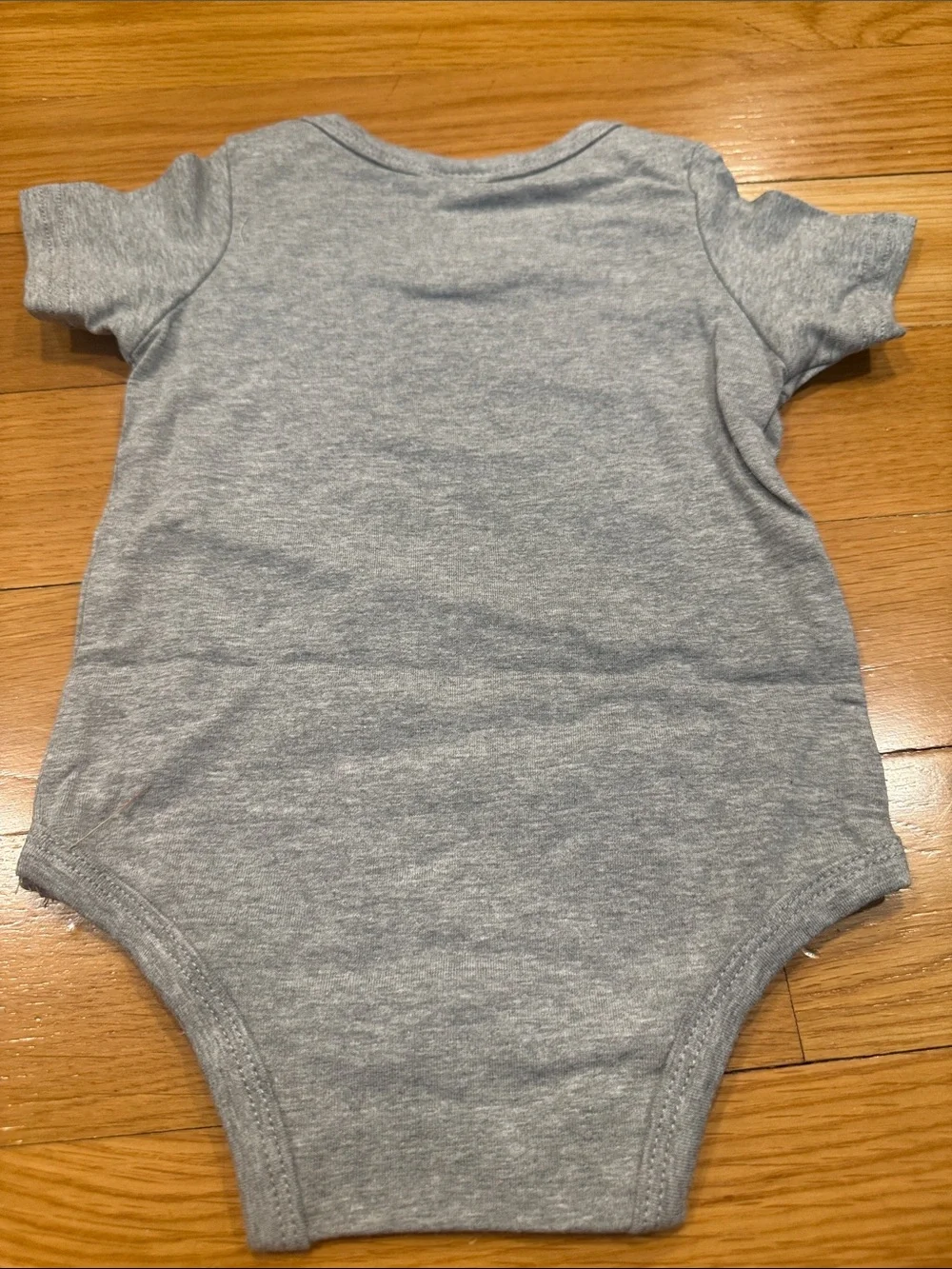 Funnycokid baby onesie Newest Member of the pack size 0-3.